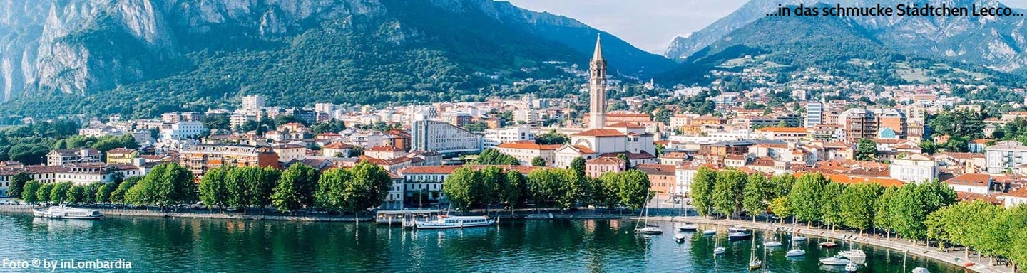 Blick über den Comer See nach Lecco und seiner Bergkulisse, Italien